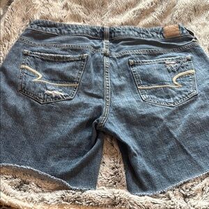 Blue Jean Cut-Off Shorts with Distressed Details